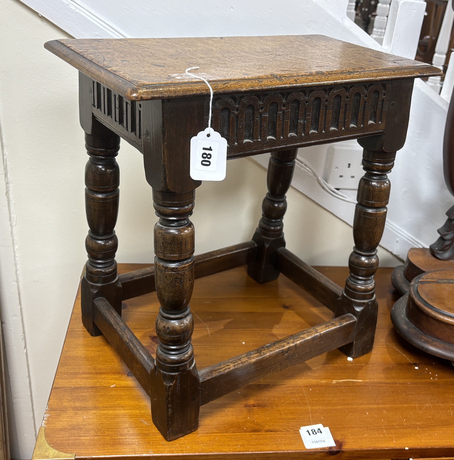 A 17th century style rectangular oak joint stool, width 44cm, depth 25cm, height 44cm